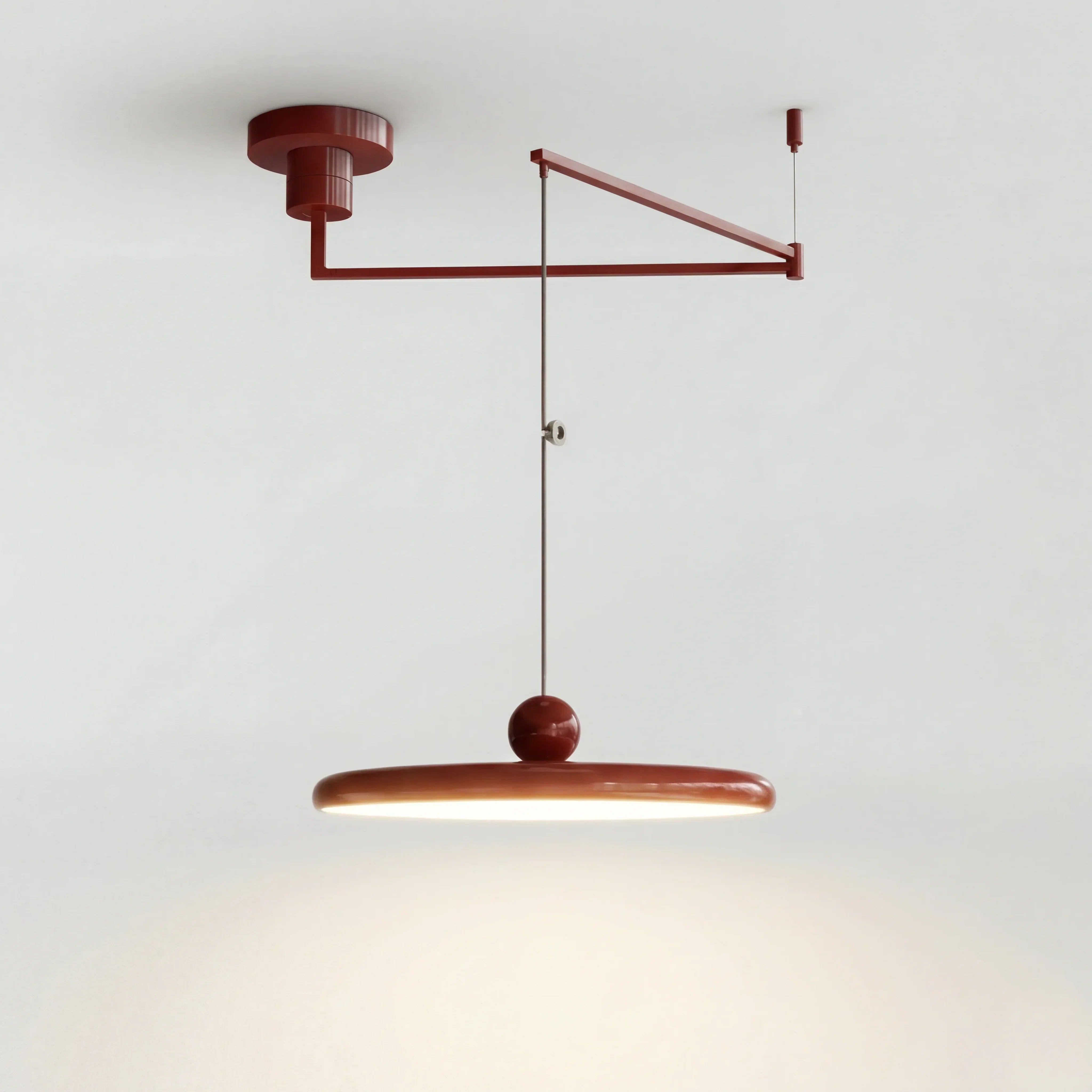 Orion Adjustable Swing Arm Acrylic Disc Pendant Light | Modern Minimalist